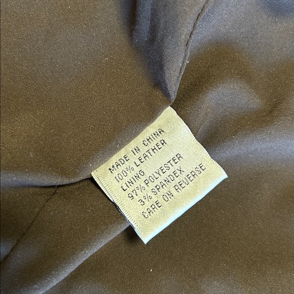 Fabulous St.John Butter Soft Leather
Jacket Embellished w/Brass
Grommets - Picture 9 of 17